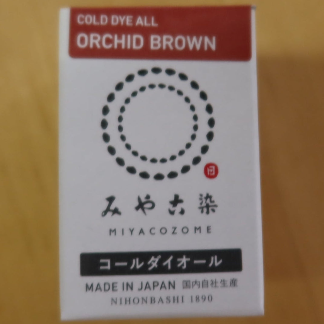Box of Miyacozome Cold Dye All in Orchid Brown on a yellow background